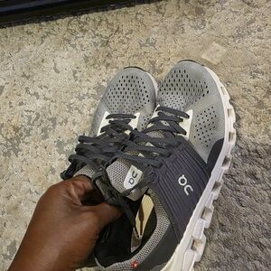 On Running Gray and Black Sneakers